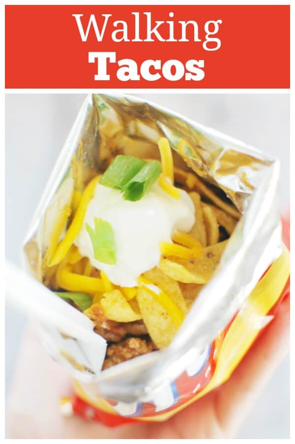 Walking Tacos - Fritos, taco meat, beans, cheese, and sour cream layered in the chip bag for an easy dinner idea! Kids love these!