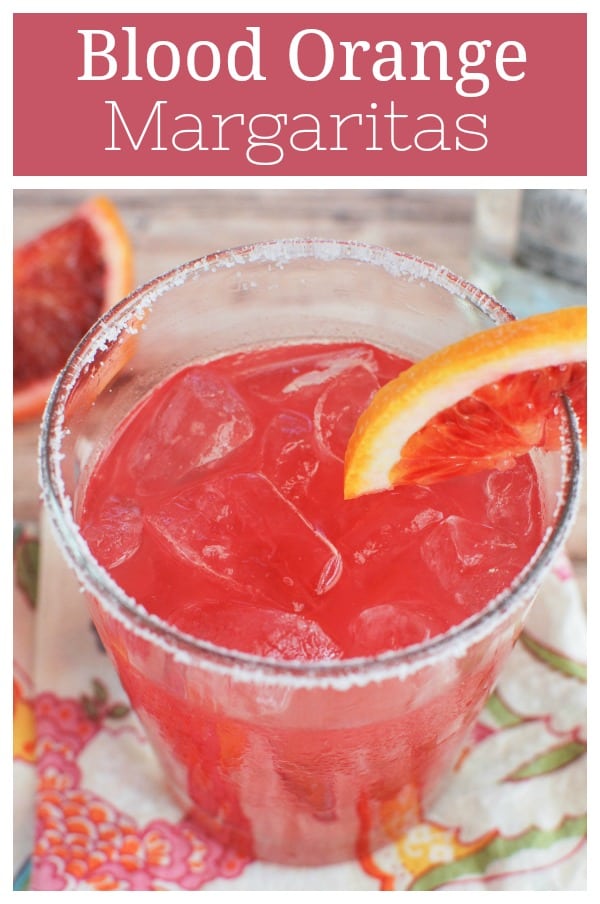Blood Orange Margaritas - the perfect winter margarita! Fresh blood orange juice, lime juice, tequila, and orange liqueur.